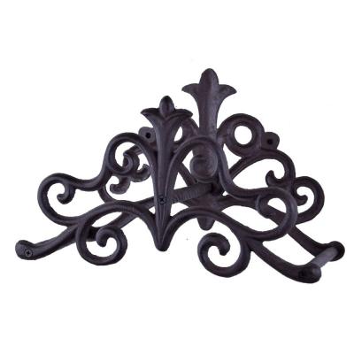 zahradní litinový držák na hadici - ornament